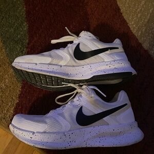 Nike women’s White and Black Running Shoes